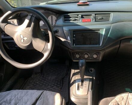 Чорний Міцубісі Lancer, об'ємом двигуна 1.6 л та пробігом 300 тис. км за 4200 $, фото 4 на Automoto.ua