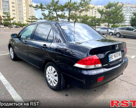 Мицубиси Лансер 2006 в Николаеве на Automoto.ua Черный Мицубиси Лансер, объемом двигателя 1.6 л и пробегом 260 тыс. км за 4999 $, фото 2 на Automoto.ua