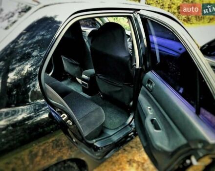 Чорний Міцубісі Lancer, об'ємом двигуна 1.6 л та пробігом 179 тис. км за 4600 $, фото 4 на Automoto.ua