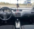 Черный Мицубиси Лансер, объемом двигателя 1.6 л и пробегом 335 тыс. км за 3500 $, фото 8 на Automoto.ua