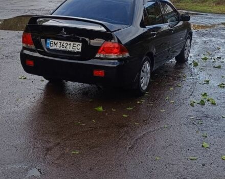 Чорний Міцубісі Lancer, об'ємом двигуна 1.6 л та пробігом 250 тис. км за 4000 $, фото 4 на Automoto.ua