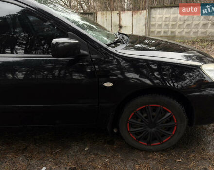 Чорний Міцубісі Lancer, об'ємом двигуна 1.58 л та пробігом 210 тис. км за 3900 $, фото 5 на Automoto.ua