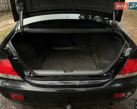 Чорний Міцубісі Lancer, об'ємом двигуна 1.58 л та пробігом 210 тис. км за 3900 $, фото 16 на Automoto.ua