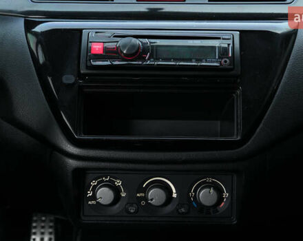 Черный Мицубиси Лансер, объемом двигателя 2 л и пробегом 253 тыс. км за 6900 $, фото 11 на Automoto.ua