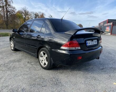 Черный Мицубиси Лансер, объемом двигателя 1.6 л и пробегом 200 тыс. км за 3400 $, фото 3 на Automoto.ua