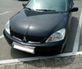 Чорний Міцубісі Lancer, об'ємом двигуна 1.6 л та пробігом 175 тис. км за 5600 $, фото 1 на Automoto.ua