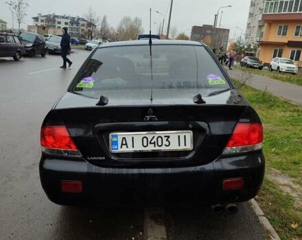 Черный Мицубиси Лансер, объемом двигателя 1.58 л и пробегом 270 тыс. км за 4000 $, фото 3 на Automoto.ua