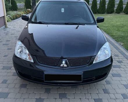 Чорний Міцубісі Lancer, об'ємом двигуна 1.6 л та пробігом 170 тис. км за 4900 $, фото 4 на Automoto.ua