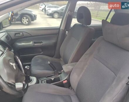 Чорний Міцубісі Lancer, об'ємом двигуна 1.58 л та пробігом 290 тис. км за 3200 $, фото 17 на Automoto.ua