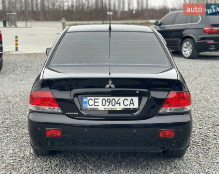 Чорний Міцубісі Lancer, об'ємом двигуна 1.58 л та пробігом 230 тис. км за 3350 $, фото 9 на Automoto.ua