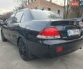 Черный Мицубиси Лансер, объемом двигателя 1.58 л и пробегом 222 тыс. км за 2999 $, фото 11 на Automoto.ua