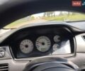 Черный Мицубиси Лансер, объемом двигателя 1.58 л и пробегом 228 тыс. км за 3500 $, фото 1 на Automoto.ua