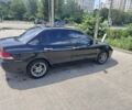 Чорний Міцубісі Lancer, об'ємом двигуна 1.6 л та пробігом 237 тис. км за 3714 $, фото 1 на Automoto.ua