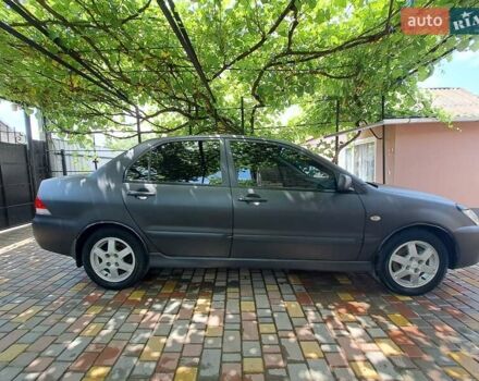 Чорний Міцубісі Lancer, об'ємом двигуна 1.58 л та пробігом 280 тис. км за 3950 $, фото 7 на Automoto.ua