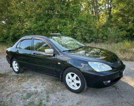 Черный Мицубиси Лансер, объемом двигателя 1.6 л и пробегом 289 тыс. км за 3200 $, фото 9 на Automoto.ua