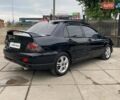 Чорний Міцубісі Lancer, об'ємом двигуна 2 л та пробігом 248 тис. км за 4990 $, фото 6 на Automoto.ua