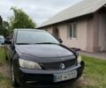 Чорний Міцубісі Lancer, об'ємом двигуна 1.58 л та пробігом 270 тис. км за 4000 $, фото 1 на Automoto.ua
