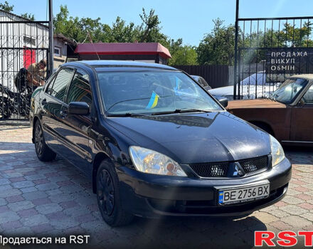 Черный Мицубиси Лансер, объемом двигателя 1.6 л и пробегом 300 тыс. км за 3599 $, фото 2 на Automoto.ua