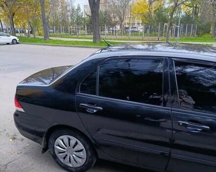 Чорний Міцубісі Lancer, об'ємом двигуна 1.6 л та пробігом 218 тис. км за 4300 $, фото 5 на Automoto.ua