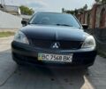 Чорний Міцубісі Lancer, об'ємом двигуна 1.6 л та пробігом 203 тис. км за 4600 $, фото 1 на Automoto.ua