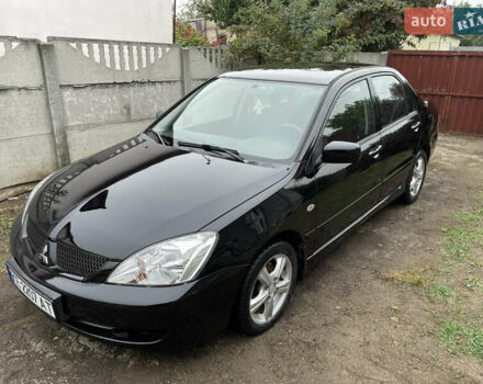 Мицубиси Лансер 2006 в Днепре (Днепропетровске) на Automoto.ua Черный Мицубиси Лансер, объемом двигателя 1.58 л и пробегом 166 тыс. км за 4800 $, фото 1 на Automoto.ua
