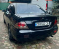 Чорний Міцубісі Lancer, об'ємом двигуна 1.59 л та пробігом 305 тис. км за 2950 $, фото 2 на Automoto.ua