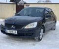 Чорний Міцубісі Lancer, об'ємом двигуна 1.6 л та пробігом 237 тис. км за 3850 $, фото 1 на Automoto.ua