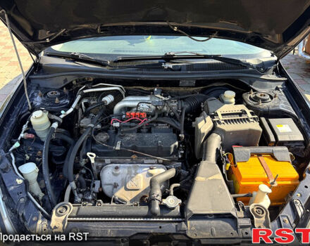 Черный Мицубиси Лансер, объемом двигателя 1.6 л и пробегом 300 тыс. км за 3599 $, фото 12 на Automoto.ua