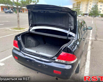 Мицубиси Лансер 2006 в Николаеве на Automoto.ua Черный Мицубиси Лансер, объемом двигателя 1.6 л и пробегом 260 тыс. км за 4999 $, фото 8 на Automoto.ua