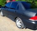Чорний Міцубісі Lancer, об'ємом двигуна 1.6 л та пробігом 211 тис. км за 3500 $, фото 3 на Automoto.ua