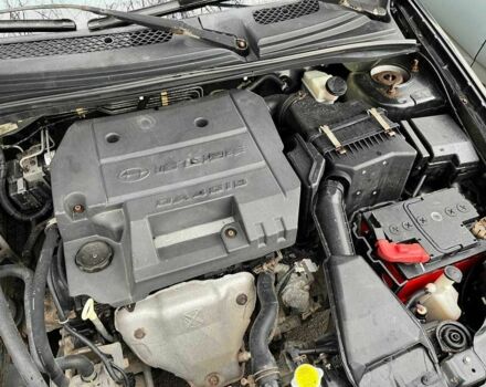 Черный Мицубиси Лансер, объемом двигателя 1.6 л и пробегом 250 тыс. км за 1300 $, фото 9 на Automoto.ua