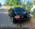 Чорний Міцубісі Lancer, об'ємом двигуна 2 л та пробігом 173 тис. км за 5200 $, фото 1 на Automoto.ua