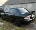 Чорний Міцубісі Lancer, об'ємом двигуна 1.6 л та пробігом 180 тис. км за 3500 $, фото 4 на Automoto.ua