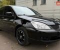 Чорний Міцубісі Lancer, об'ємом двигуна 1.58 л та пробігом 386 тис. км за 4450 $, фото 7 на Automoto.ua