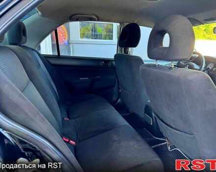Чорний Міцубісі Lancer, об'ємом двигуна 1.6 л та пробігом 176 тис. км за 3777 $, фото 5 на Automoto.ua