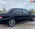 Чорний Міцубісі Lancer, об'ємом двигуна 1.6 л та пробігом 335 тис. км за 3500 $, фото 5 на Automoto.ua
