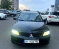 Черный Мицубиси Лансер, объемом двигателя 1.6 л и пробегом 270 тыс. км за 5200 $, фото 1 на Automoto.ua