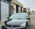 Чорний Міцубісі Lancer, об'ємом двигуна 2 л та пробігом 222 тис. км за 4000 $, фото 1 на Automoto.ua