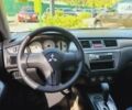 Чорний Міцубісі Lancer, об'ємом двигуна 1.58 л та пробігом 230 тис. км за 4900 $, фото 7 на Automoto.ua