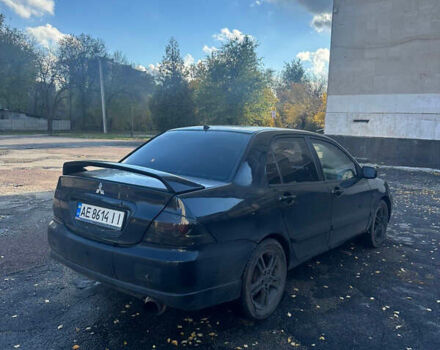 Чорний Міцубісі Lancer, об'ємом двигуна 2 л та пробігом 270 тис. км за 3300 $, фото 1 на Automoto.ua