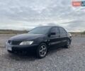 Чорний Міцубісі Lancer, об'ємом двигуна 1.6 л та пробігом 335 тис. км за 3500 $, фото 11 на Automoto.ua