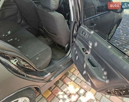 Чорний Міцубісі Lancer, об'ємом двигуна 1.58 л та пробігом 280 тис. км за 3950 $, фото 21 на Automoto.ua