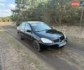 Черный Мицубиси Лансер, объемом двигателя 1.6 л и пробегом 310 тыс. км за 2999 $, фото 1 на Automoto.ua