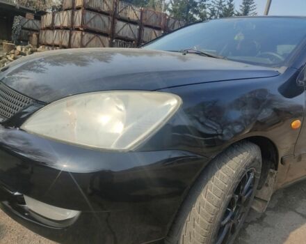 Черный Мицубиси Лансер, объемом двигателя 1.6 л и пробегом 260 тыс. км за 3800 $, фото 1 на Automoto.ua