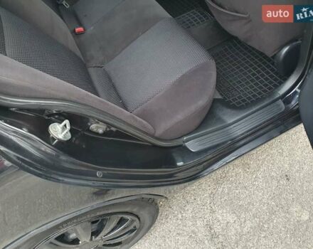 Черный Мицубиси Лансер, объемом двигателя 1.58 л и пробегом 222 тыс. км за 2999 $, фото 7 на Automoto.ua