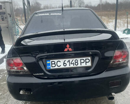 Черный Мицубиси Лансер, объемом двигателя 1.6 л и пробегом 280 тыс. км за 3100 $, фото 3 на Automoto.ua