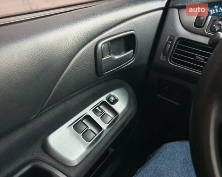 Чорний Міцубісі Lancer, об'ємом двигуна 1.58 л та пробігом 222 тис. км за 2999 $, фото 26 на Automoto.ua