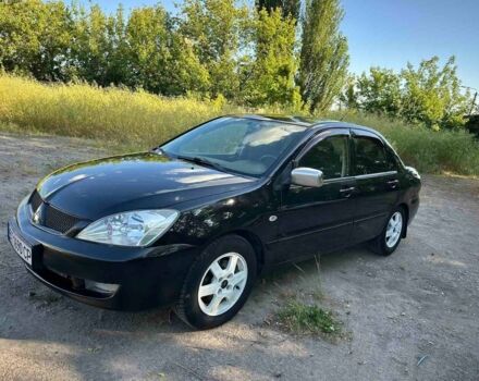 Черный Мицубиси Лансер, объемом двигателя 1.6 л и пробегом 289 тыс. км за 3200 $, фото 8 на Automoto.ua