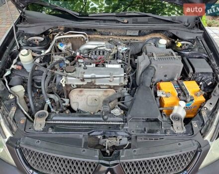 Чорний Міцубісі Lancer, об'ємом двигуна 1.58 л та пробігом 280 тис. км за 3950 $, фото 23 на Automoto.ua