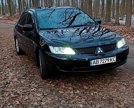 Чорний Міцубісі Lancer, об'ємом двигуна 1.6 л та пробігом 345 тис. км за 3700 $, фото 1 на Automoto.ua